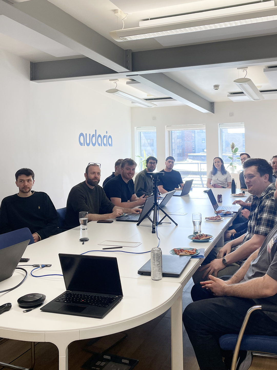 Audacia team gathering in the office